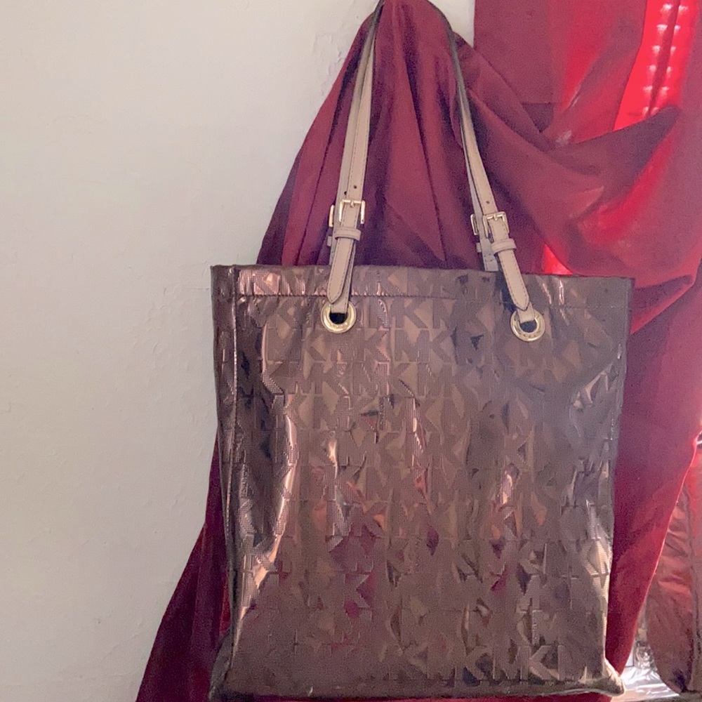 MK Brown Patent Tote  Length  15 inches Width 13 in   Like new. No stains inside